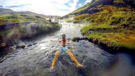 High jump gold medallist Derek Drouin floats in a hotspring atop a mountain in Iceland to unwind after the stress of Olympic competition. Derek Drouin Vacation