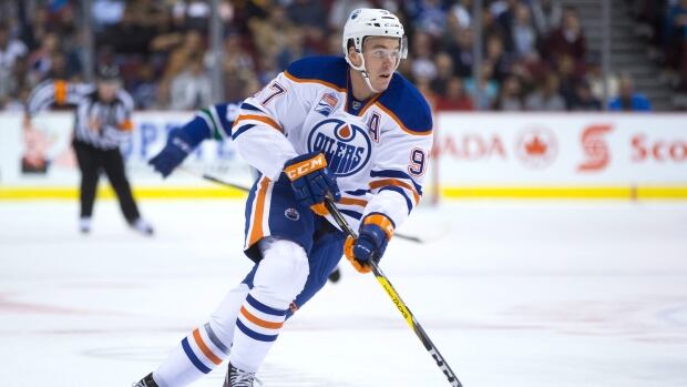 Edmonton Oilers' Connor McDavid skates with the puck during a 5-3 loss to the Vancouver Canucks on Wednesday. mcdavid-connor
