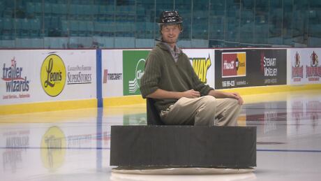 James Upham of Moncton's Resurgo Place shows off the human hockey puck hovercraft he invented using two leaf blowers. Fans will be invited to ride in it during intermission at the Moncton Wildcats games. James Upham human hockey puck