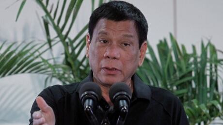 Philippines President Rodrigo Duterte gestures during a news conference upon his arrival back in the country from a state visit in Vietnam. PHILIPPINES-DUTERTE/HITLER