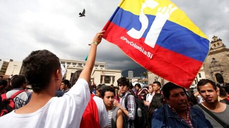 University students and supporters of the peace deal signed between the government and Revolutionary Armed Forces of Colombia (FARC) rebels display a flag during a rally in front of Congress in Bogota, Colombia, Oct. 3, 2016. COLOMBIA-PEACE/REFERENDUM -- Oct. 3, 2016