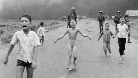 FILE - This is a June 8, 1972 file photo of South Vietnamese forces follow after terrified children, including 9-year-old Kim Phuc, center, as they run down Route 1 near Trang Bang after an aerial napalm attack on suspected Viet Cong hiding places . Norway's Prime Minister Erna Solberg on Friday Sept. 9, 2016 challenged Facebook’s restrictions on nude photos by posting an iconic 1972 image of a naked girl running from an aerial napalm attack in Vietnam. The Pulitzer Prize-winning image by Associated Press photographer Nick Ut is at the center of a heated debate about freedom of speech in Norway after Facebook deleted it from a Norwegian author’s page last month. (AP Photo/Nick Ut, File) Norway-Facebook-Napalm-Girl