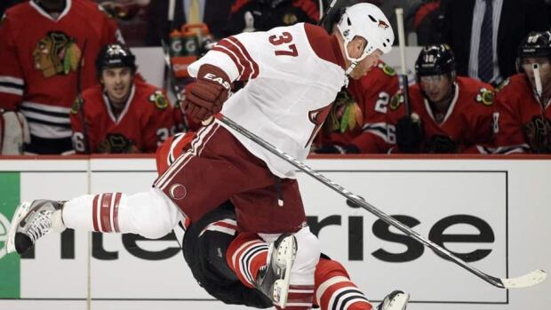San Jose Sharks left wing Raffi Torres, right, was suspended for hitting Los Angeles Kings center Jarret Stoll, left, during Game 1 Tuesday.
