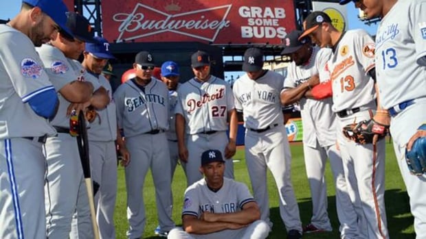 Major League Baseball tweeted this photo of Yankees legend Mariano Rivera surrounded by his American League teammates prior to the 2013 All-Star Game in New York. Rivera would go on to win MVP honours and several players tweeted congratulatory messages.