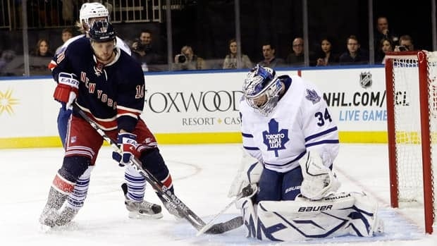 Despite an early advantage, goaltender James Reimer, right, and the Toronto Maple Leafs failed to hold off the dominating New York Rangers.