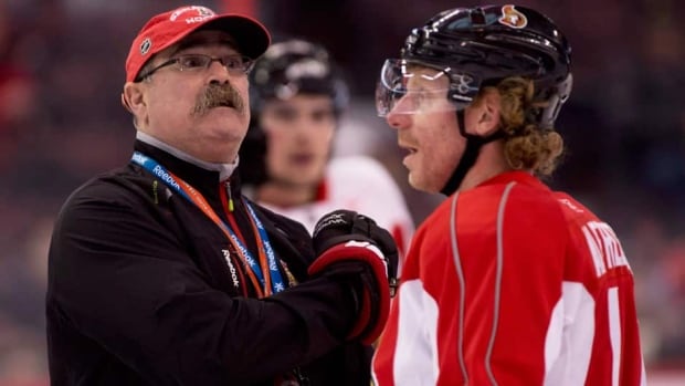 Ottawa Senators head coach Paul MacLean, left, and captain Daniel Alfredsson both won NHL awards on Friday.