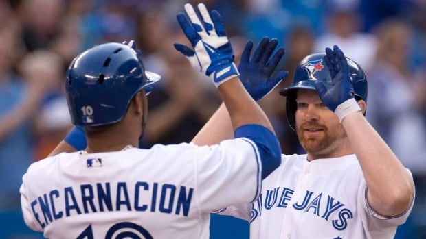 Toronto Blue Jays slugger Edwin Encarncacion, left, and teammate Adam Lind have keyed a recent Blue Jays hot streak.