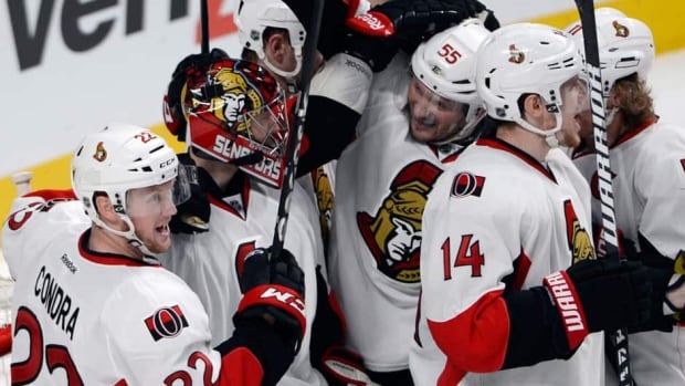 Ottawa Senators goalie Craig Anderson (41) celebrates with teamates after winning their first round playoff series against the Montreal Canadiens on Thursday.