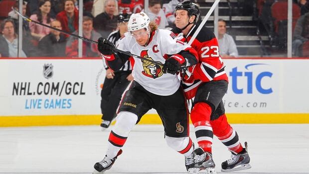 Daniel Alfredsson, left, seen here with the Ottawa Senators, and David Clarkson, seen here as a member of the New Jersey Devils, were the two hottest topics of the day amongst NHL players as they both decided to sign with new teams.