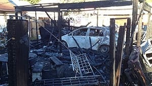 mi-car-garage-fire