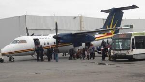 li-620-plane-evacuees-cbc
