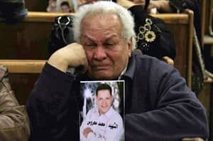 si-egypt-soccer-mourner-300-ap-03895878
