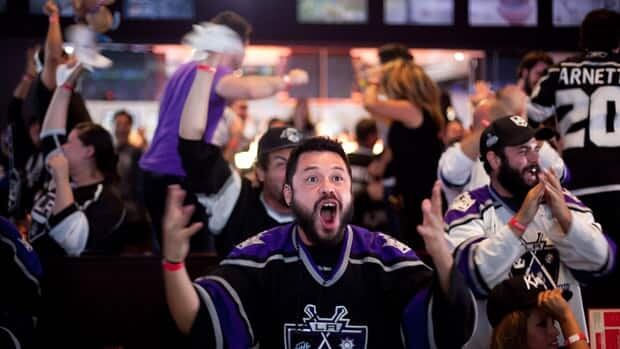 Fans celebrate a goal scored by the Los Angeles Kings during Game 6 in Los Angeles, California.