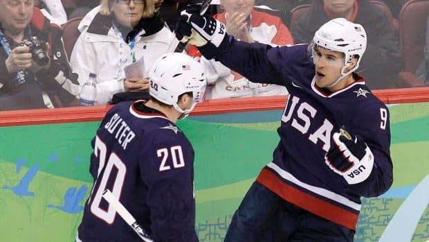 Defenceman Ryan Suter (20) and forward Zach Parise (9), shown in this 2010 file photo during ther Vancouver Olympics, will be reunited as teammates on the Minnesota Wild.