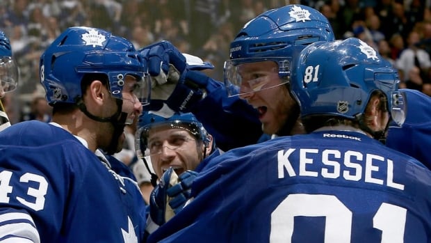 Nazem Kadri (43) and Cody Franson (4) of the Toronto Maple Leafs celebrate Phil Kessel's goal against the Boston Bruins in Game 6 at the Air Canada Centre in Toronto Sunday.