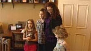 mi-bc-120715-heidi-rogerro-family
