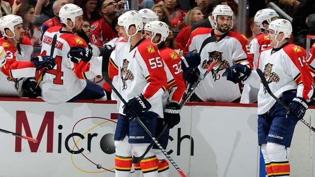 Despite a 4-2 loss to the Washington Capitals on Thursday, Ed Jovanovski (55) and the Florida Panthers clinched their first playoff spot in 12 years.