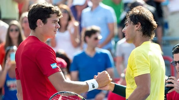 Canada's Milos Raonic, left, congratulates Rafael Nadal of Spain for winning the final at the Rogers Cup tennis tournament in Montreal on Sunday.