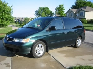 Green Honda Odyssey van