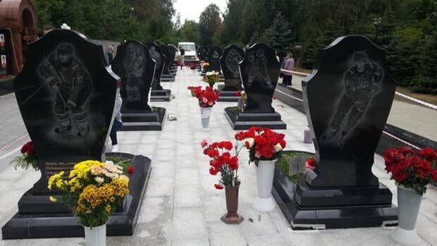 A look at the monument for fallen members of the KHL's Lokomotiv Yaroslavl hockey club in Leontyevskoe cemetery on the one year anniversary of the tragedy.