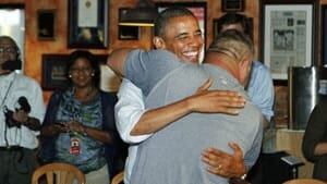 si-obama-hug-300