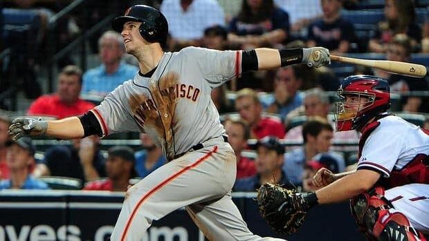 Giants catcher Buster Posey is hitting over .300 this season and on track for 20 home runs and 100 runs batted in.