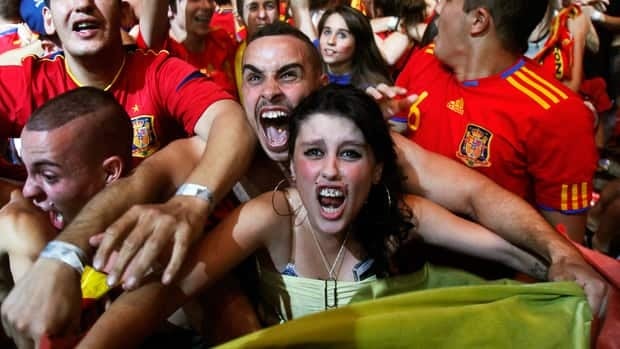 Spanish soccer fans celebrate in Madrid after watching their team defeat Portugal in the European championship semifinal on Wednesday.
