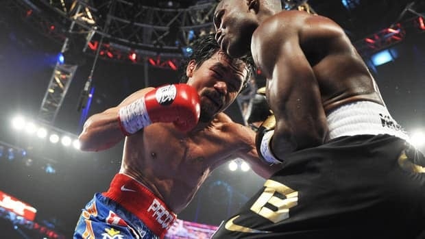 Manny Pacquiao, left, goes on the attack against Timothy Bradley during their WBO welterweight title match at the MGM Grand Arena in Las Vegas, Nevada on Saturday.
