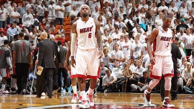 LeBron James (6) and Dwyane Wade (3) of the Miami Heat walk off the court in Game 5 against the Boston Celtics in Miami.