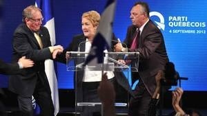 hi-852-marois-rushed-offstage-4col