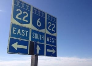 Signs mark Highway 22 north of Regina