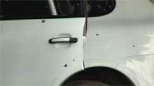 mi-bc-110815-porsche-bullet-holes