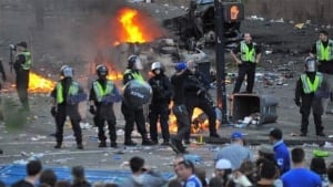 li-bc-110615-riot-police-burning-car