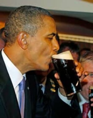 ip-220-obama-drinks-guinness-ireland-ap-rtr2msma