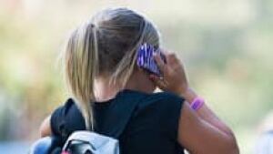 sm-220-girl-talking-cellphone-01192793