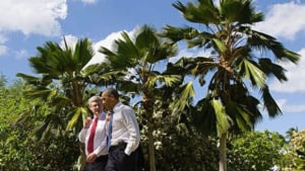 mi-obama-harper-01616637