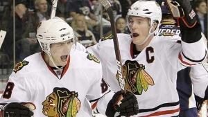 kane-toews-hawks_584