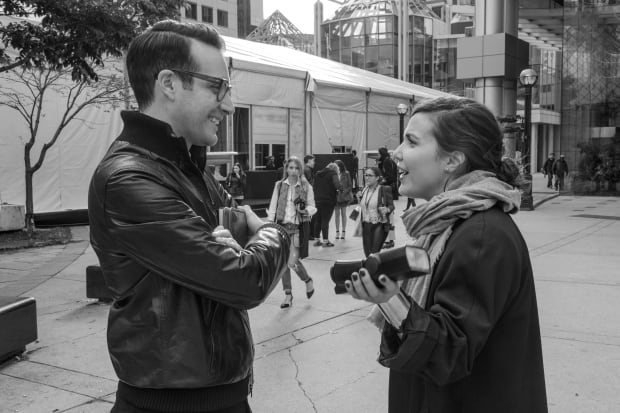 Conferring journalists at Fashion Week