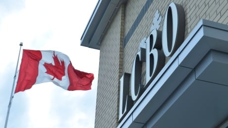 A Canadian flag flies near an under construction LCBO store in Bowmanville, Ontario on Saturday July 20, 2013. Ontario's restaurant owners want the province's liquor agency to give them the same deep discounts it gives to diplomats.The Liquor Control Board of Ontario last month started giving foreign embassies and consulates a 49 per cent discount on beer, wine and liquor prices. THE CANADIAN PRESS/Doug Ives LCBO Bargain Booze