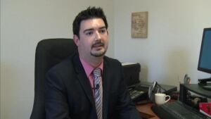 Christopher Mitchelmore in his St. Anthony constituency office