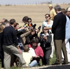 harper-cornergas060829