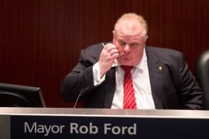 Rob Ford sits in council chambers on Nov. 18, 2013