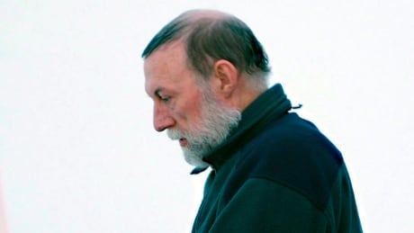Catholic priest Eric Dejaeger leaves an Iqaluit, Nunavut courtroom Jan. 20, 2011 after his first appearance for 6 child sexual abuse charges in Igloolik dating back to the 1970s. Priest North Justice