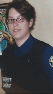 Sheriff's deputy Natalie Doucet says she was let go after a van crash in April 2012