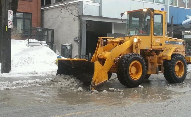 City of Ottawa crews clearing slush puddles freezing rain Monday Jan. 6 2014