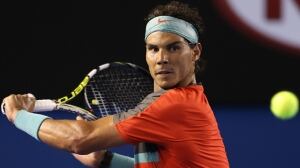 Rafael Nadal sets for a backhand return in a 7-6, 6-3, 6-3 semifinal victory over Roger Federer at Melbourne Park on Friday.