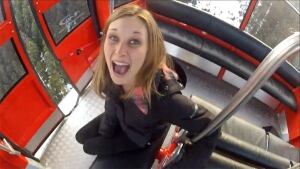 Woman with BASE jumper Whistler Peak 2 Peak Gondola