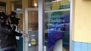 Rainbow flag in window of Spencer Chandra Herbert constituency office