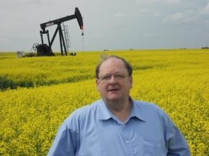 Tom Marshall in a canola field