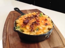Mac & Cheese w Bothwell aged cheddar sauce with broccoli and bacon, baked with a crunchy pretzel top